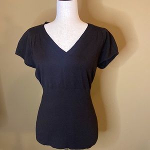 Alex Marie black sweater shirt. 83% wool sweater in a Large size. Original tags.